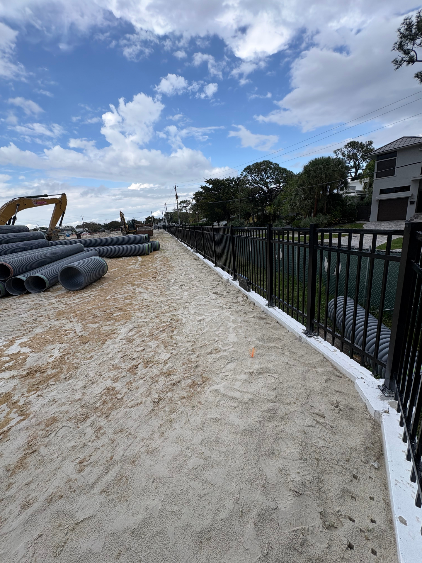 Black aluminum perimeter fence on commercial site